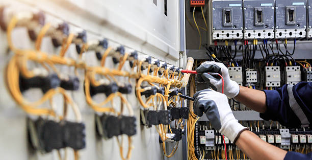Professional Electrician technician working in White Cloud, MI